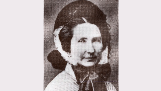 Portrait photographique de Marie Goegg-Pouchoulin, militante féministe suisse du XIXᵉ siècle, figure pionnière de la lutte pour l’égalité civile et l’éducation des femmes.